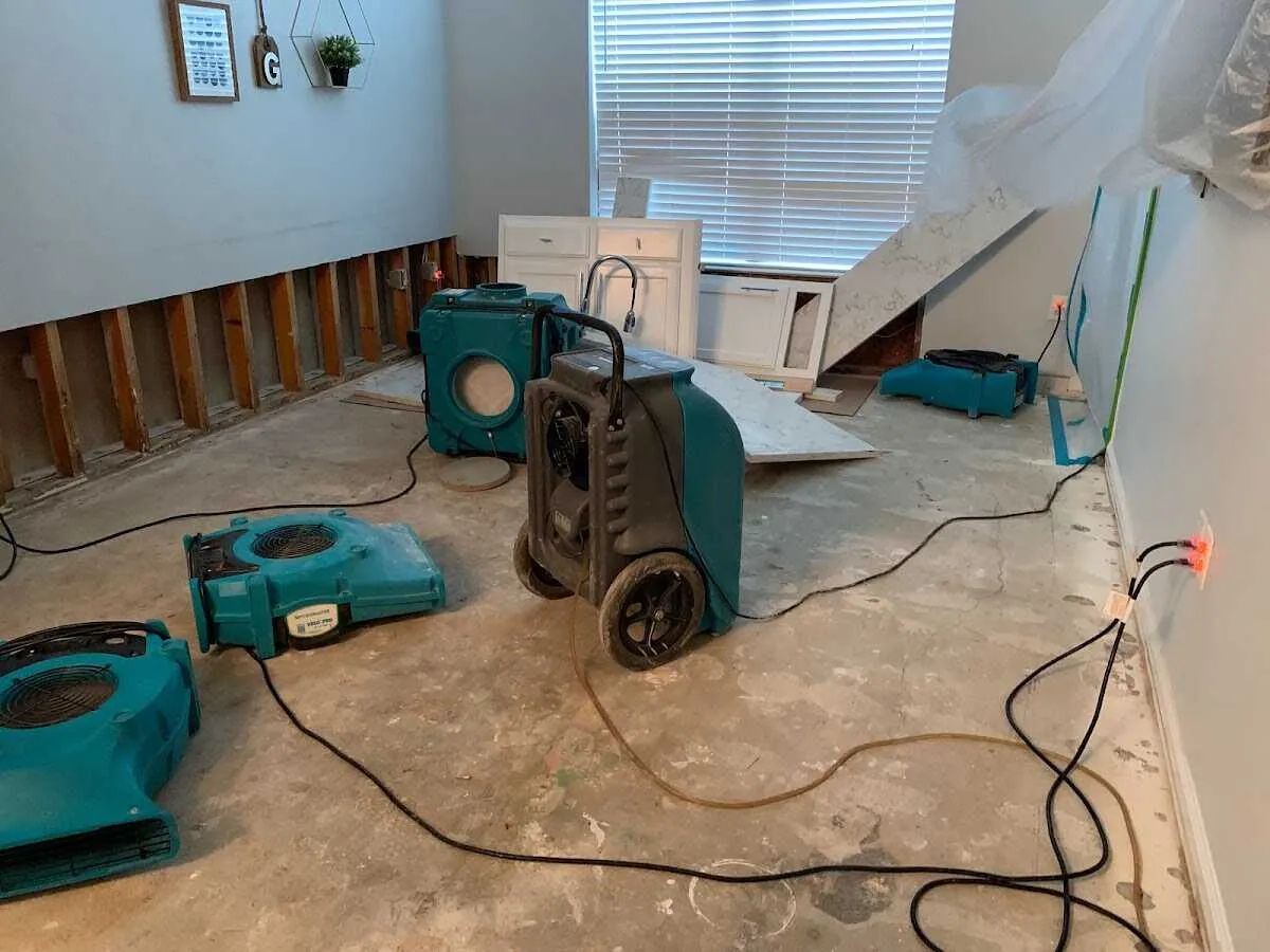 Dehumidifier in flood-cut room for Water Damage Restoration in Hopkinton